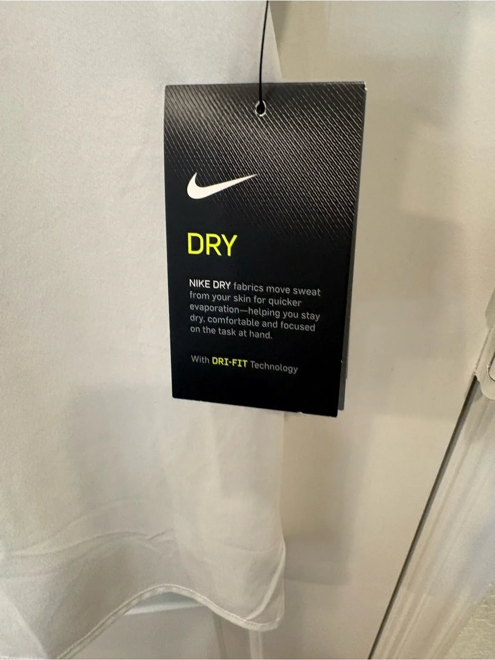 Nike Women’s White Short Sleeve Dri-FIT Tee with Black Swoosh - Picture 5 of 6